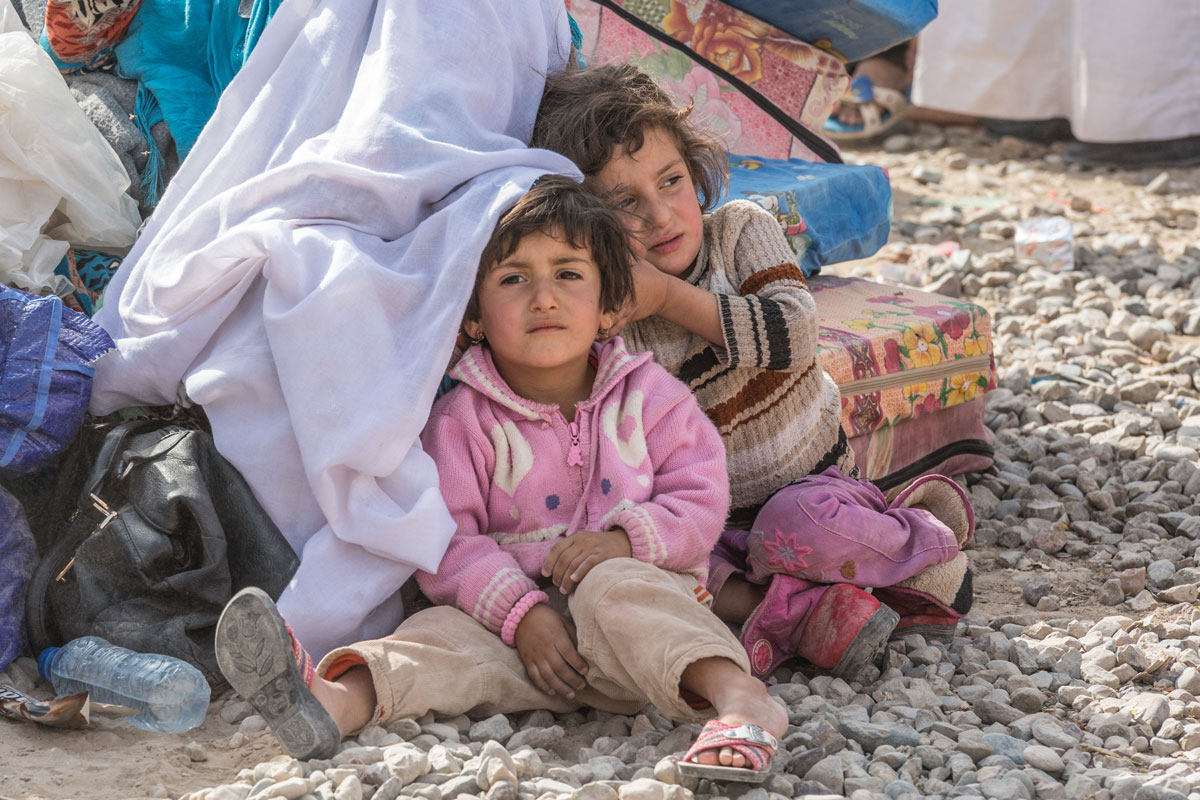 Many children who fled Mosul did so in the cover of darkness, with only the clothes on their backs across harsh terrain and in freezing temperatures.