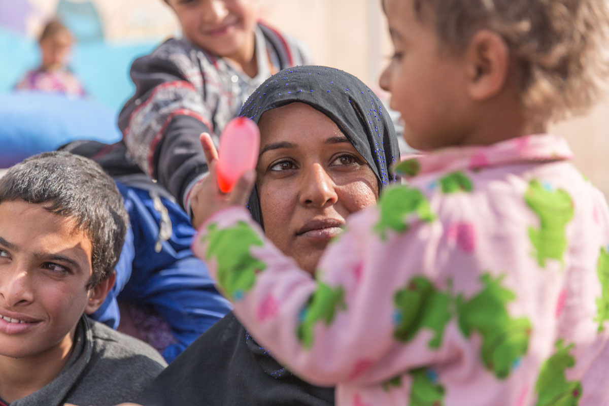 “Our lives have been very difficult, but the biggest difficulty has been for my children,” says *Sabri, who’s living with her family in Debaga Camp. “Under ISIL, they were not allowed to play with each other and they were not allowed to go outside.”