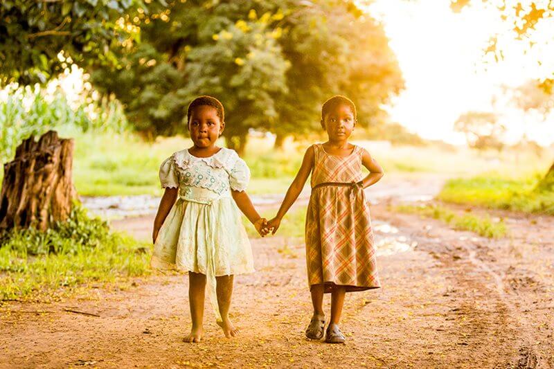 Barbara and Lulu walking home together from school safely