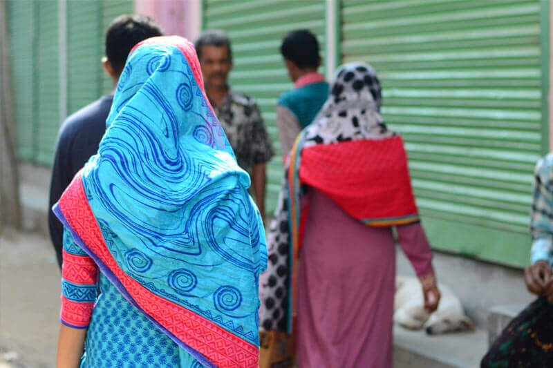 Bithi walking with her family