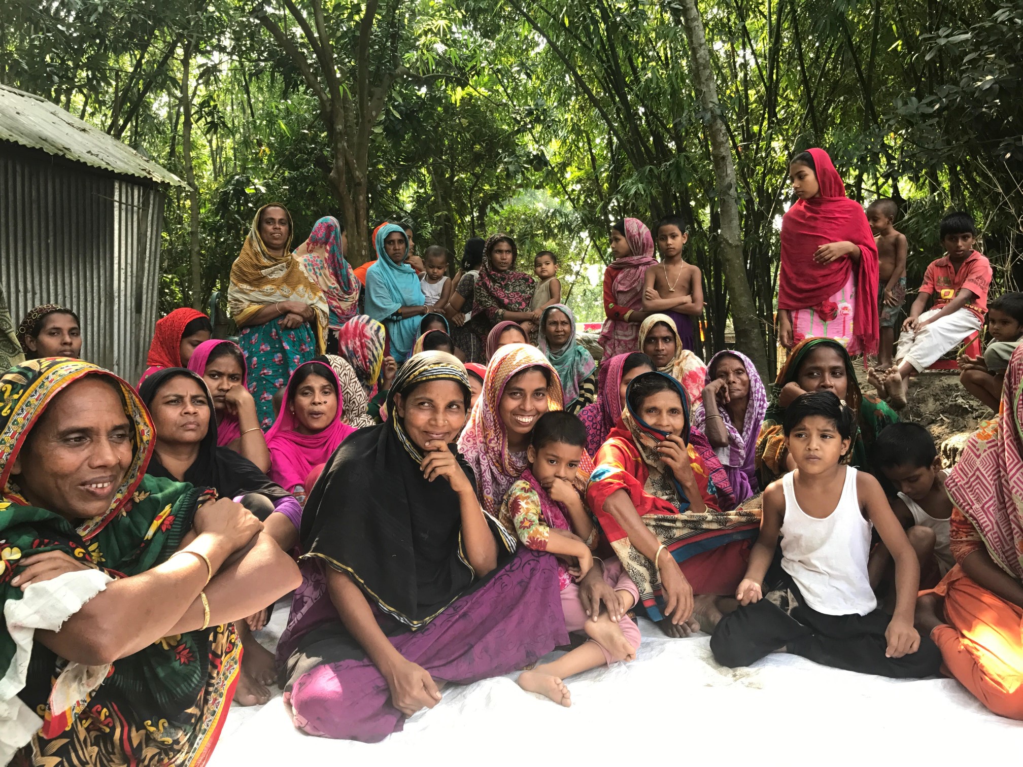 women sitting on the ground