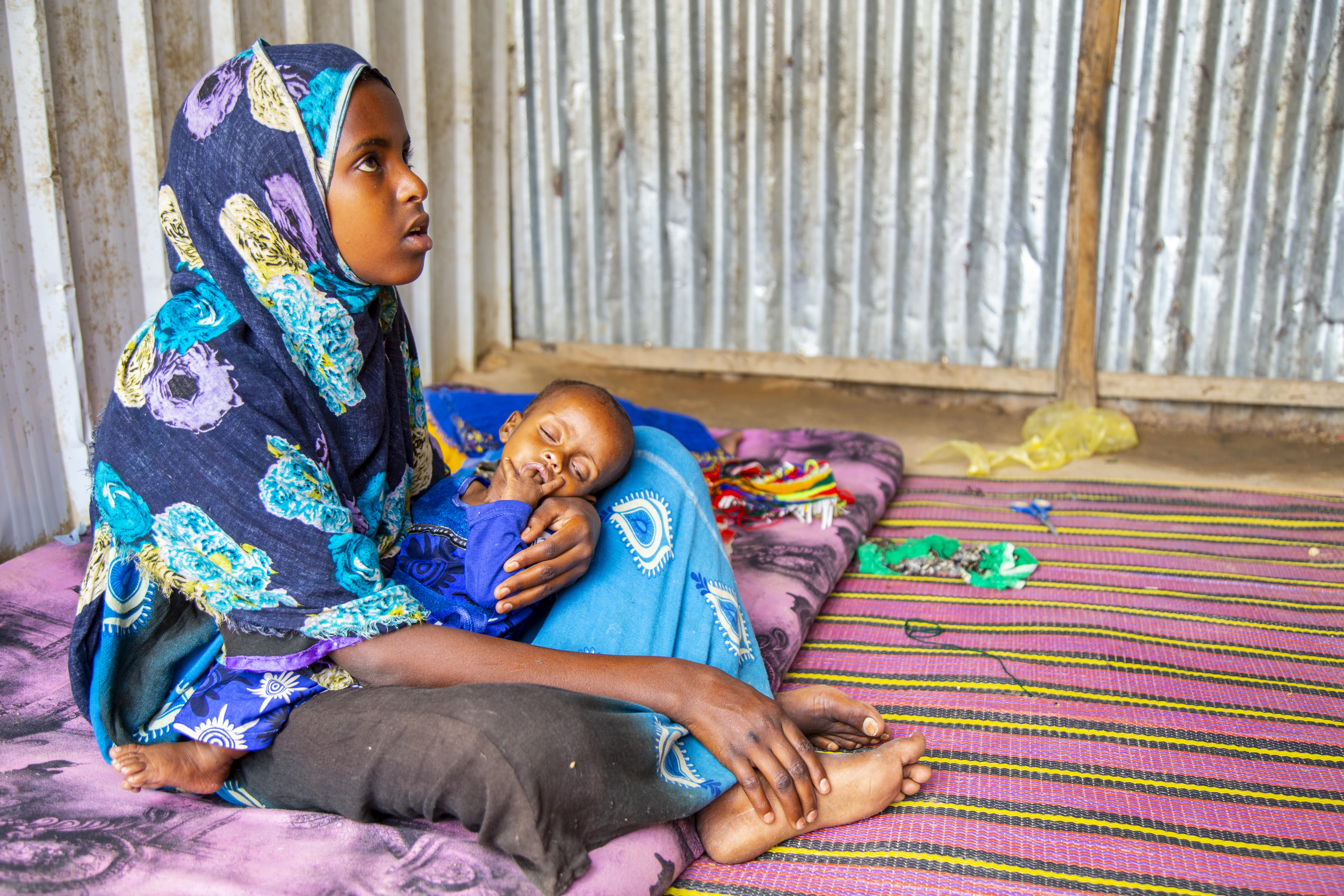 14-year-old Rahima, looks after her sibling Hamdi