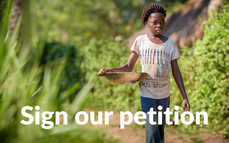 Child eating famine child sponsorship
