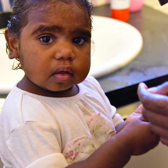 Child washing hands