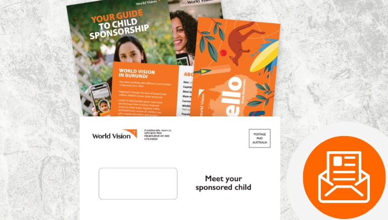 An envelope and welcome pack that is sent in the mail to new child sponsors for World Vision Australia