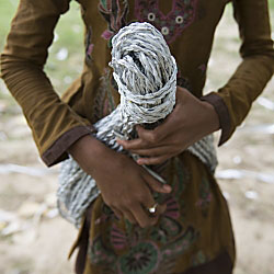 Child holding rope