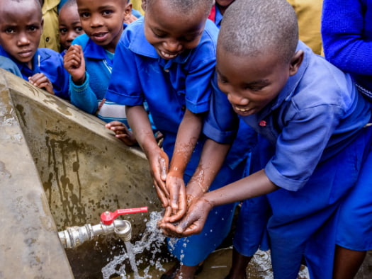 School children now have clean water to wash their hands with and to drink, at Kigogo Primary School in Rwanda.