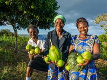 Janet, 39, and her farmers' group have transformed their once barren land into fertile, productive gardens.