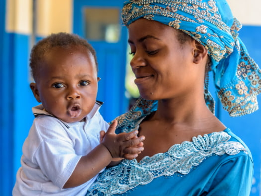 Mothers and their babies gather for maternal and child health monitoring at a health clinic in the Democratic Republic of the Congo.