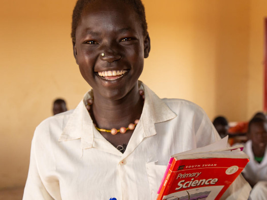 Rebecca attends school in South Sudan, where she loves to read and learn about science.