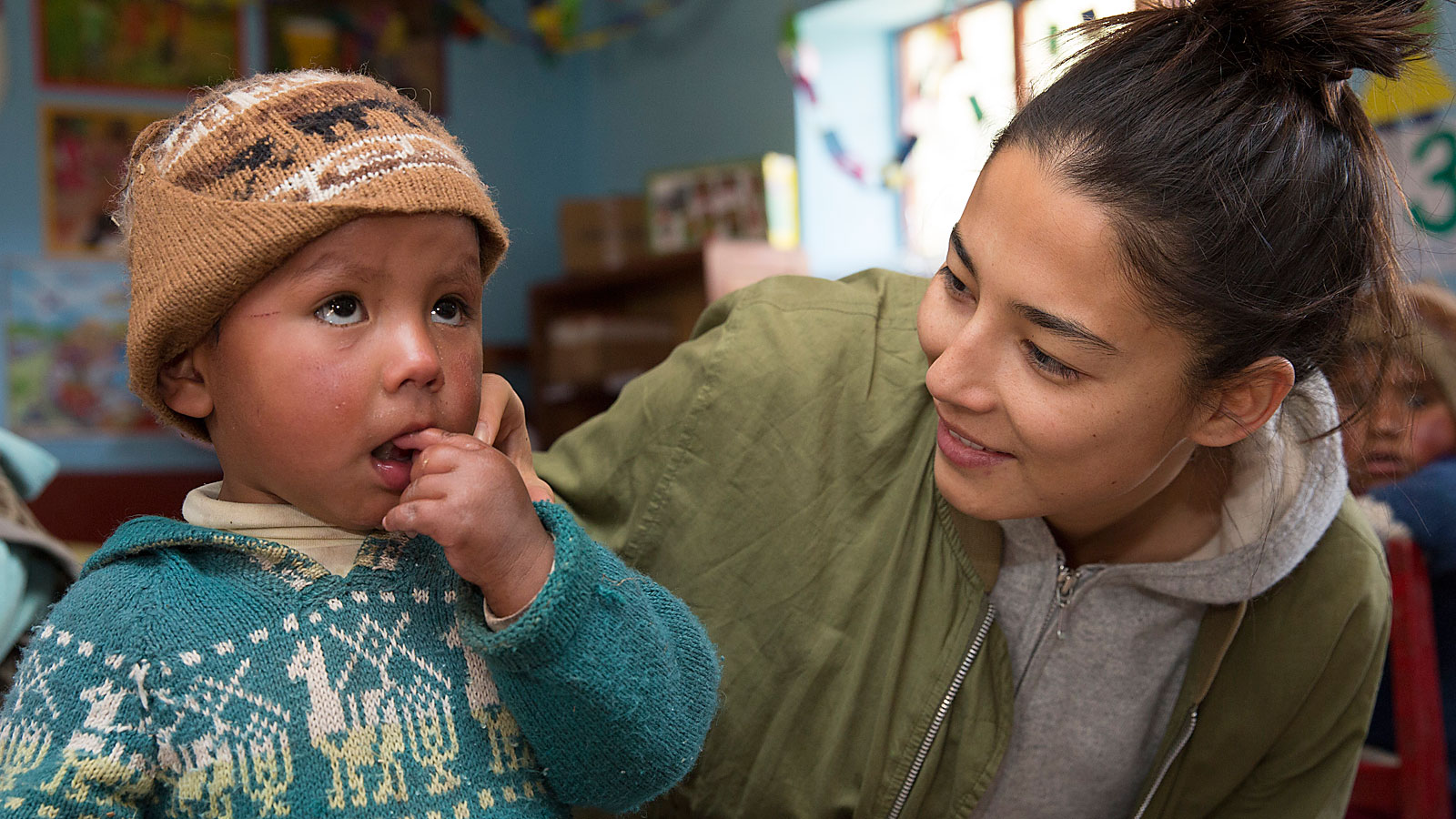 Jessica Gomes with a child in Lamay