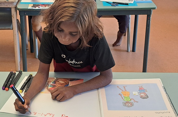 A First Nations student in a classroom.